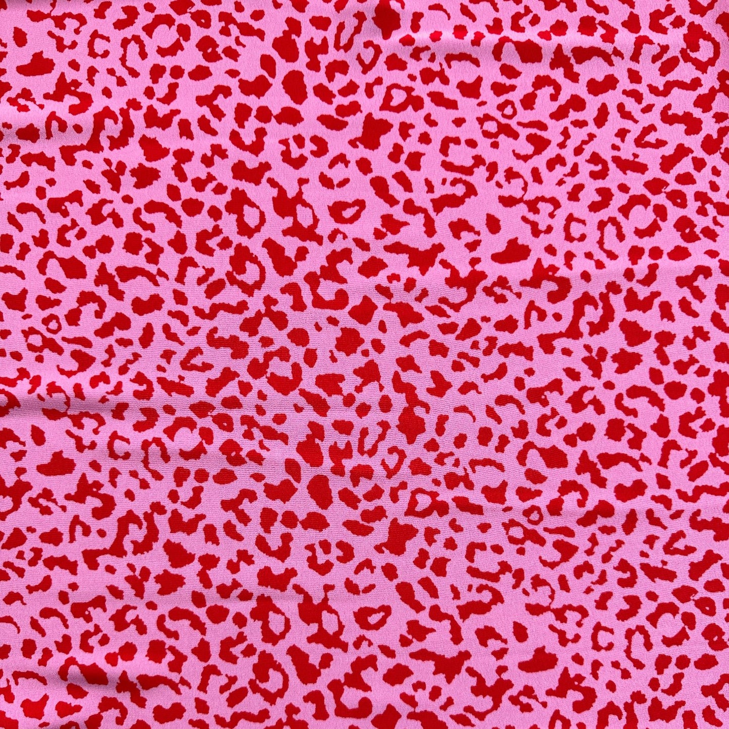Leopard Crepe Fabric in Pink and Red
