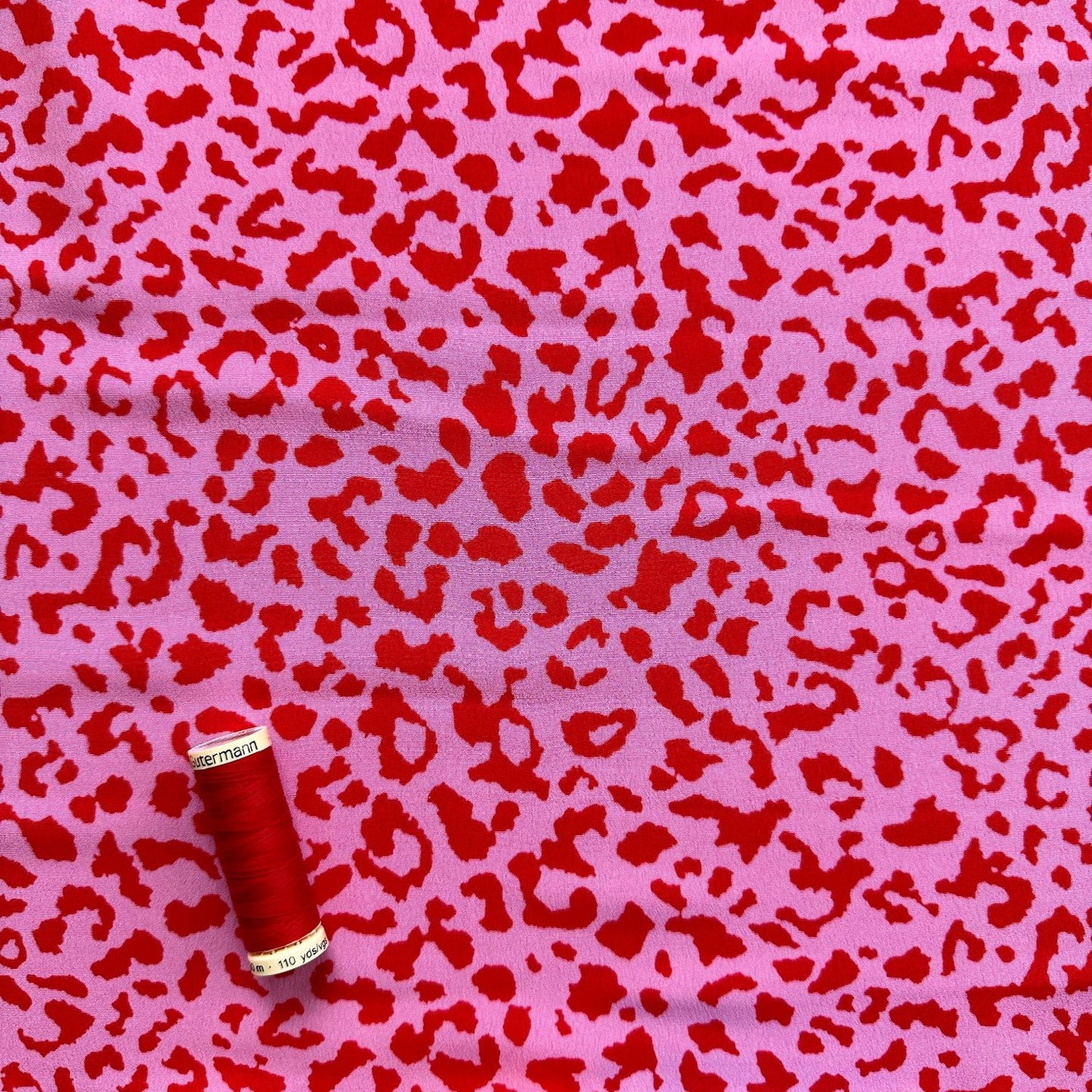 Leopard Crepe Fabric in Pink and Red