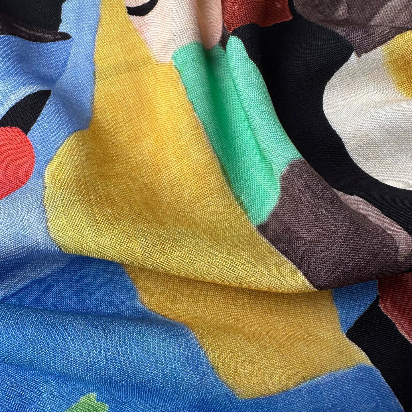 Close up of colourful fabric with abstract pattern