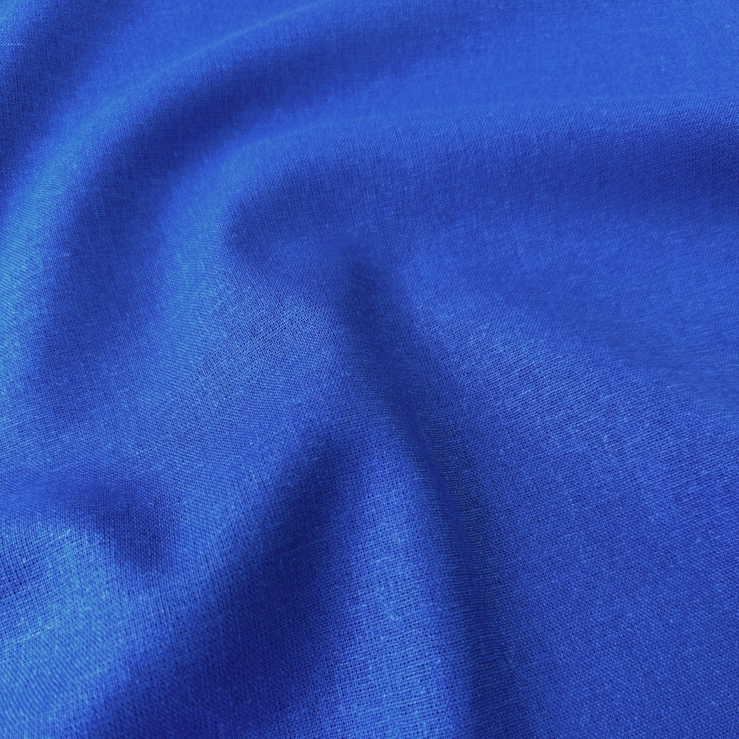 Close-up of blue viscose linen dressmaking fabric