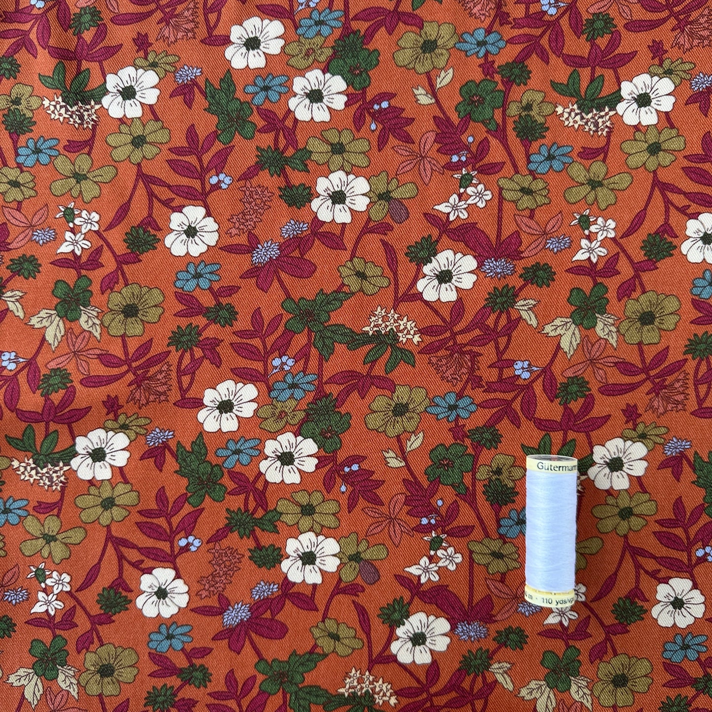 Flowers Viscose Twill Fabric in Burnt Orange
