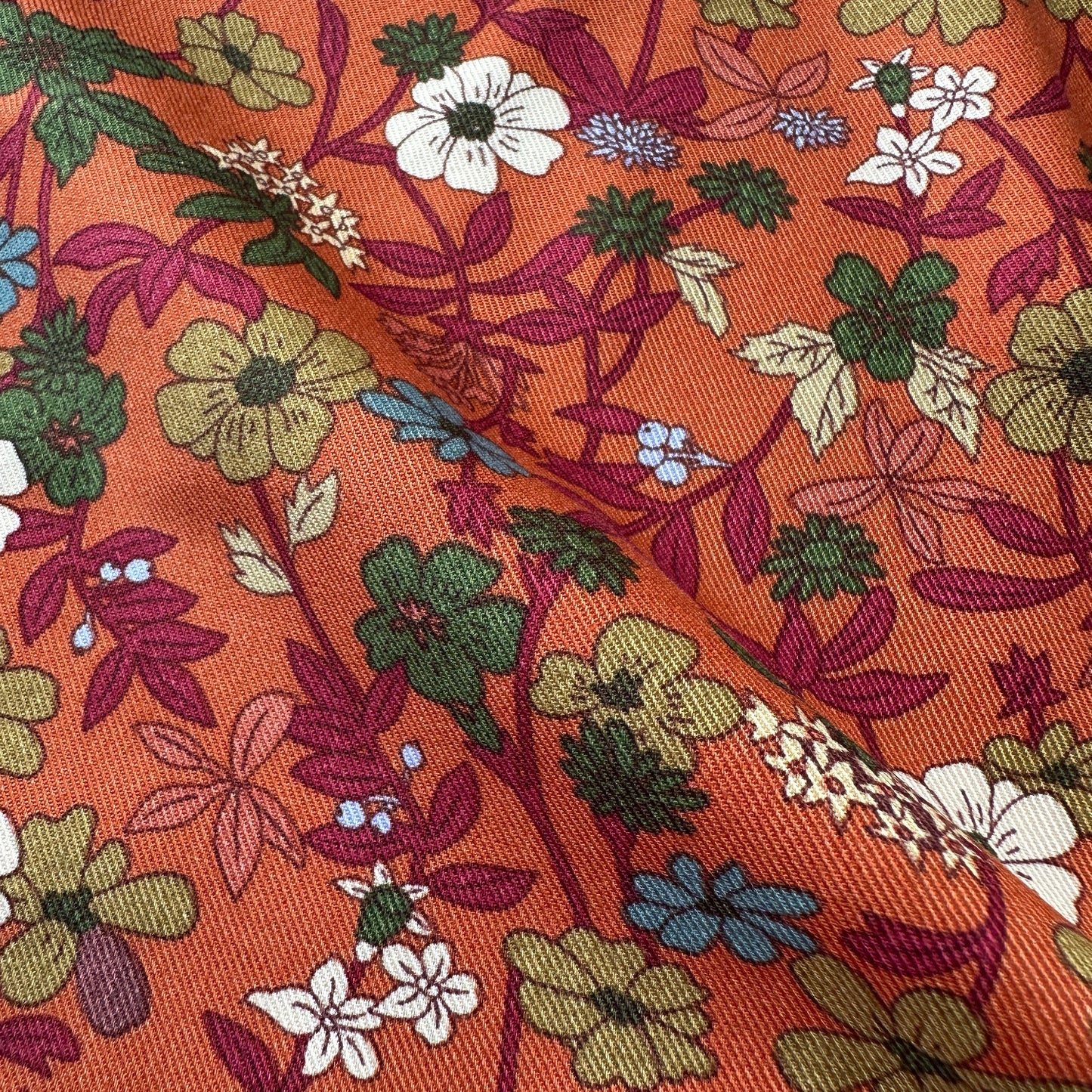 Flowers Viscose Twill Fabric in Burnt Orange