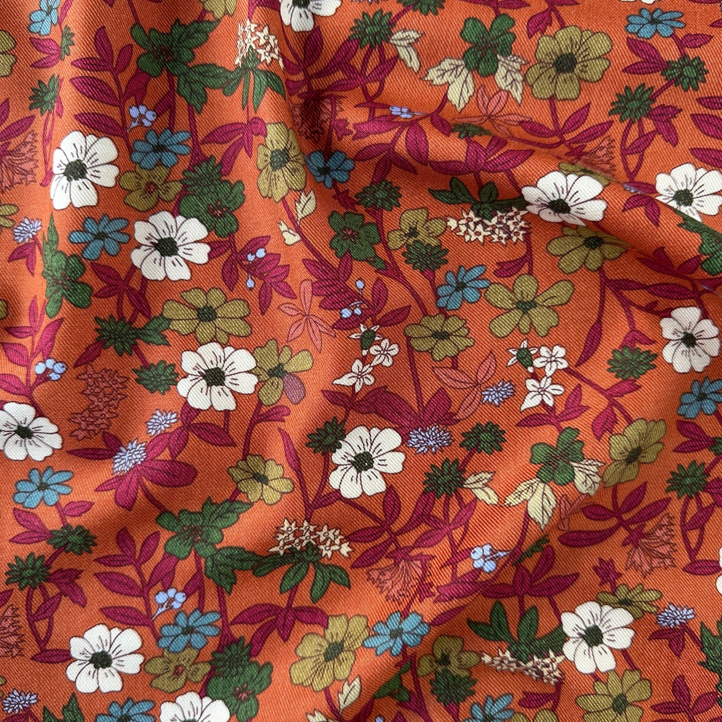 Flowers Viscose Twill Fabric in Burnt Orange