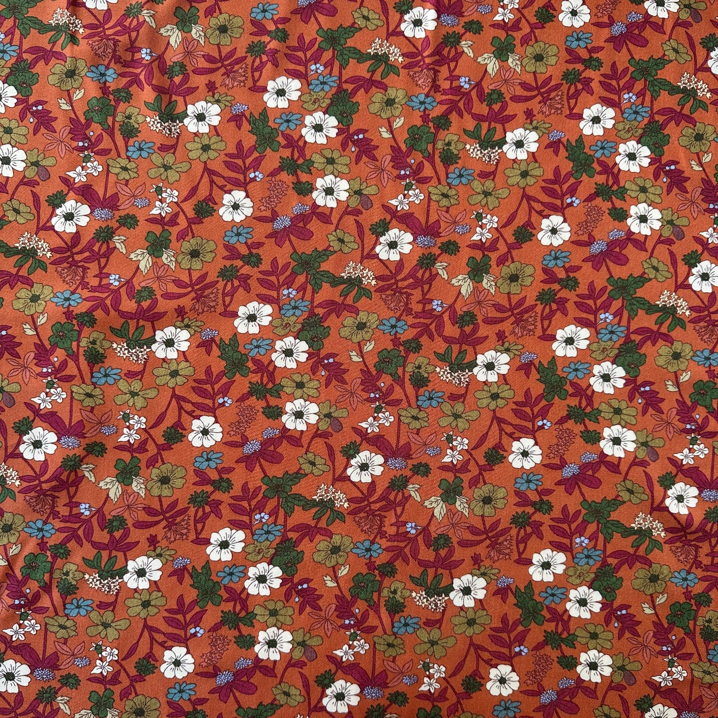 Flowers Viscose Twill Fabric in Burnt Orange