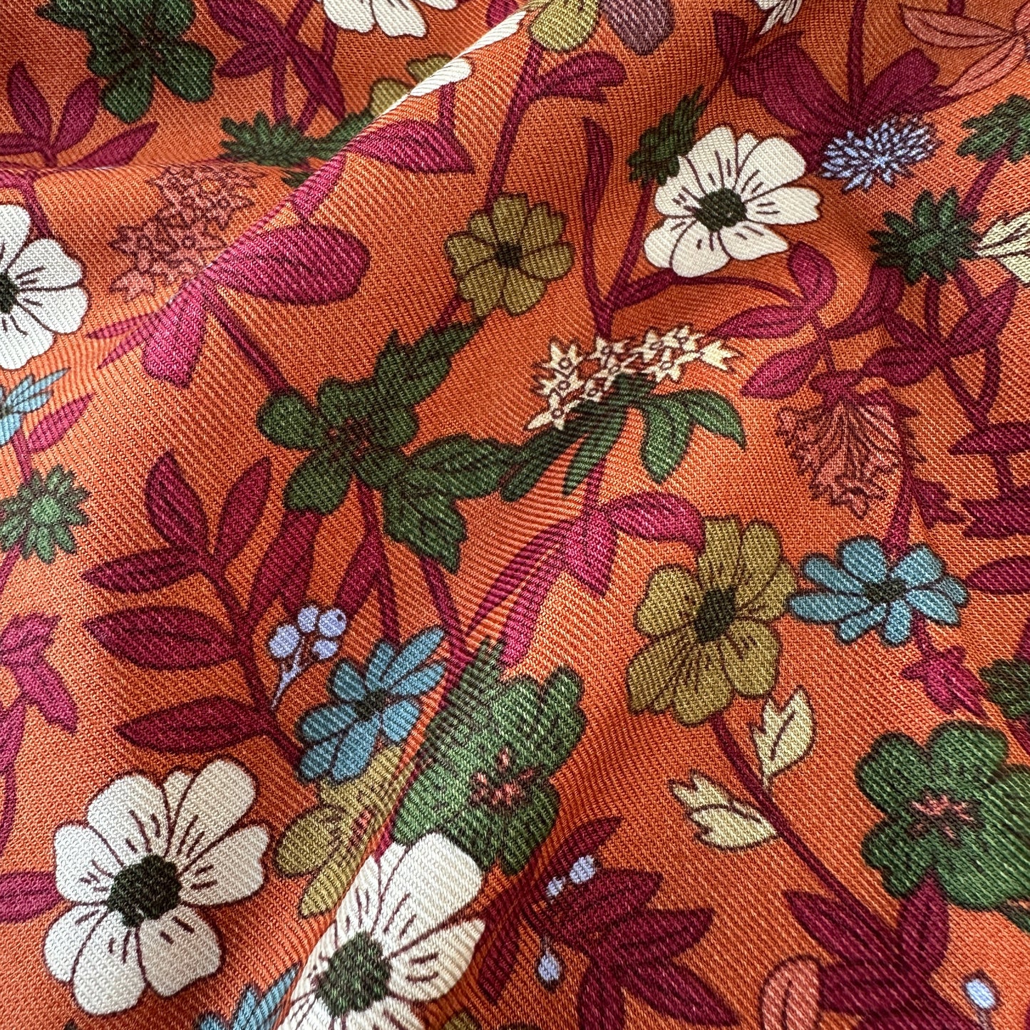 Flowers Viscose Twill Fabric in Burnt Orange