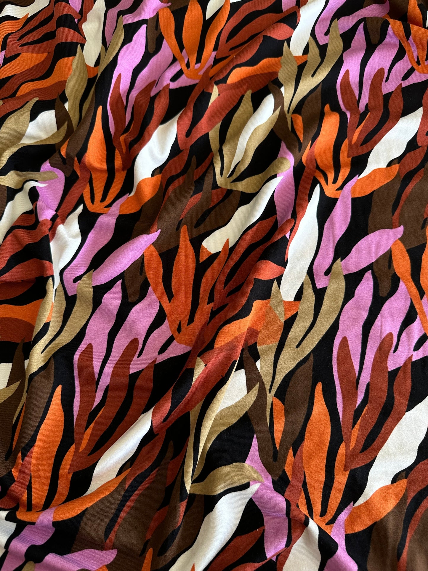Leaves Viscose Jersey Fabric in Orange