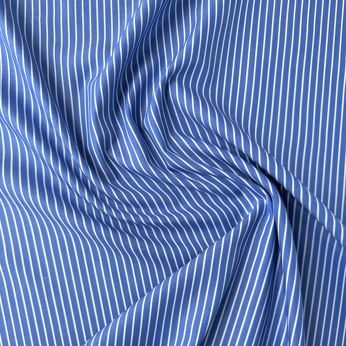Close up of blue and white striped fabric