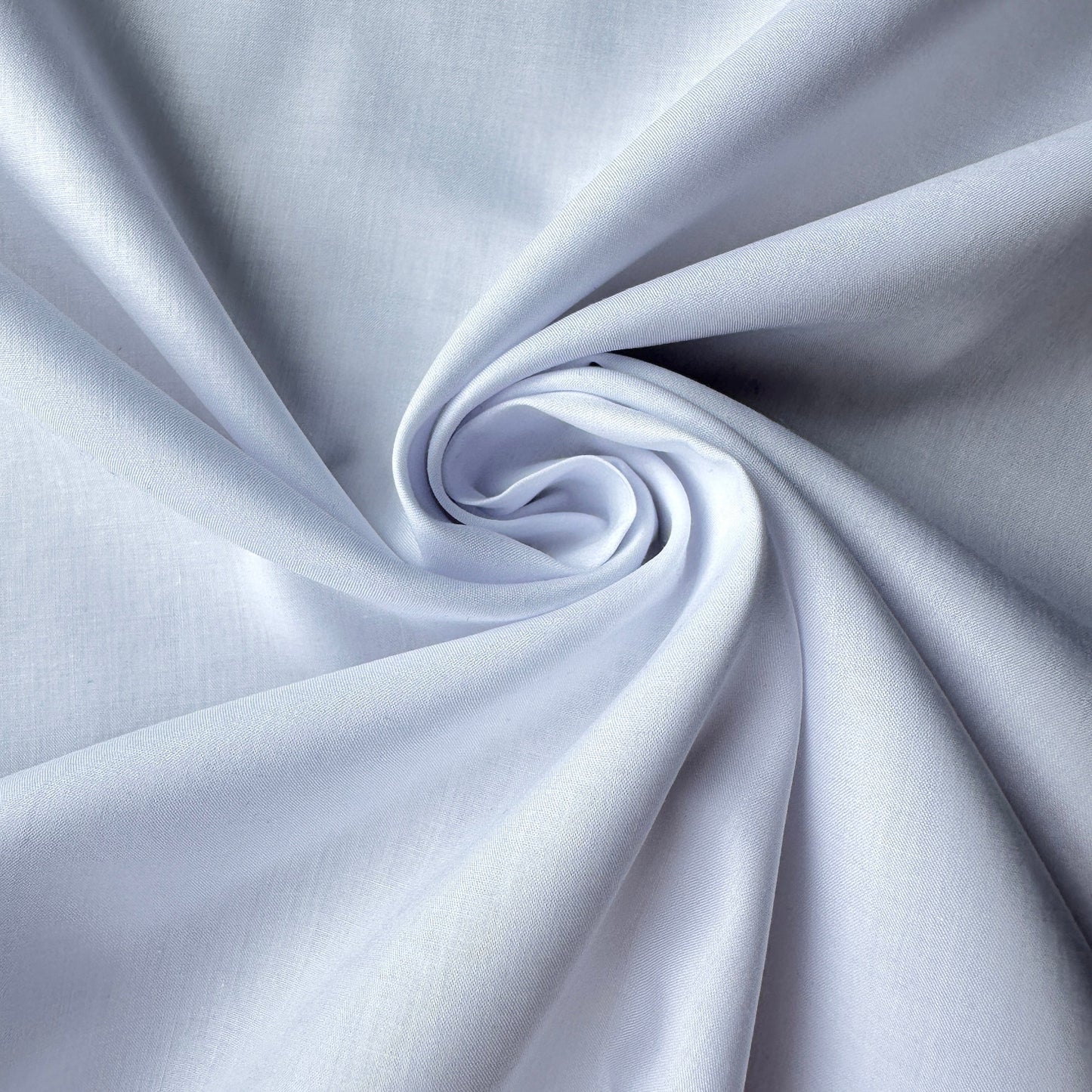 Swirl of supima cotton lawn fabric in white