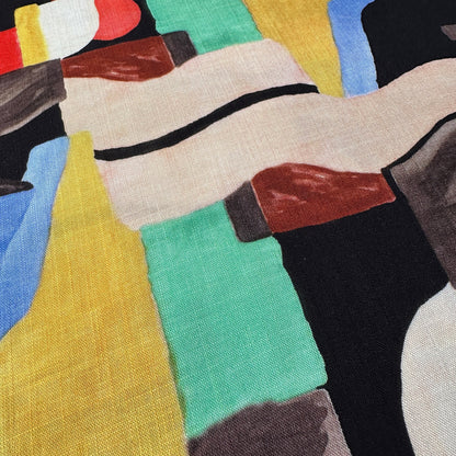 Geometric shapes in various colours on a textured viscose fabric
