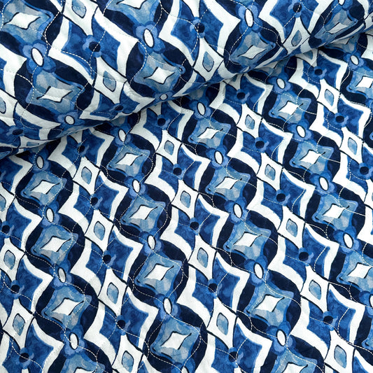 Blue and white diamonds on quilted viscose fabric