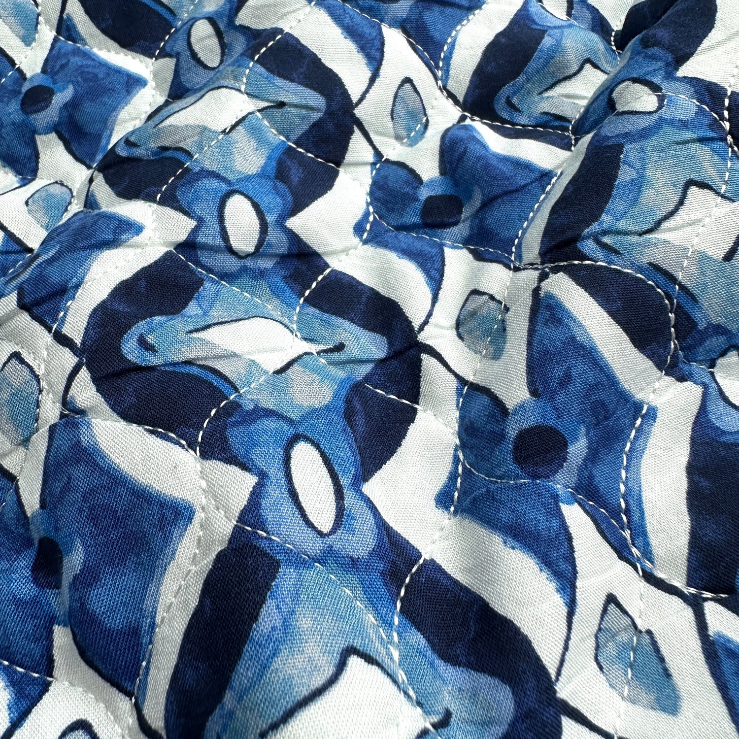 Close up of blue and white patterned fabric