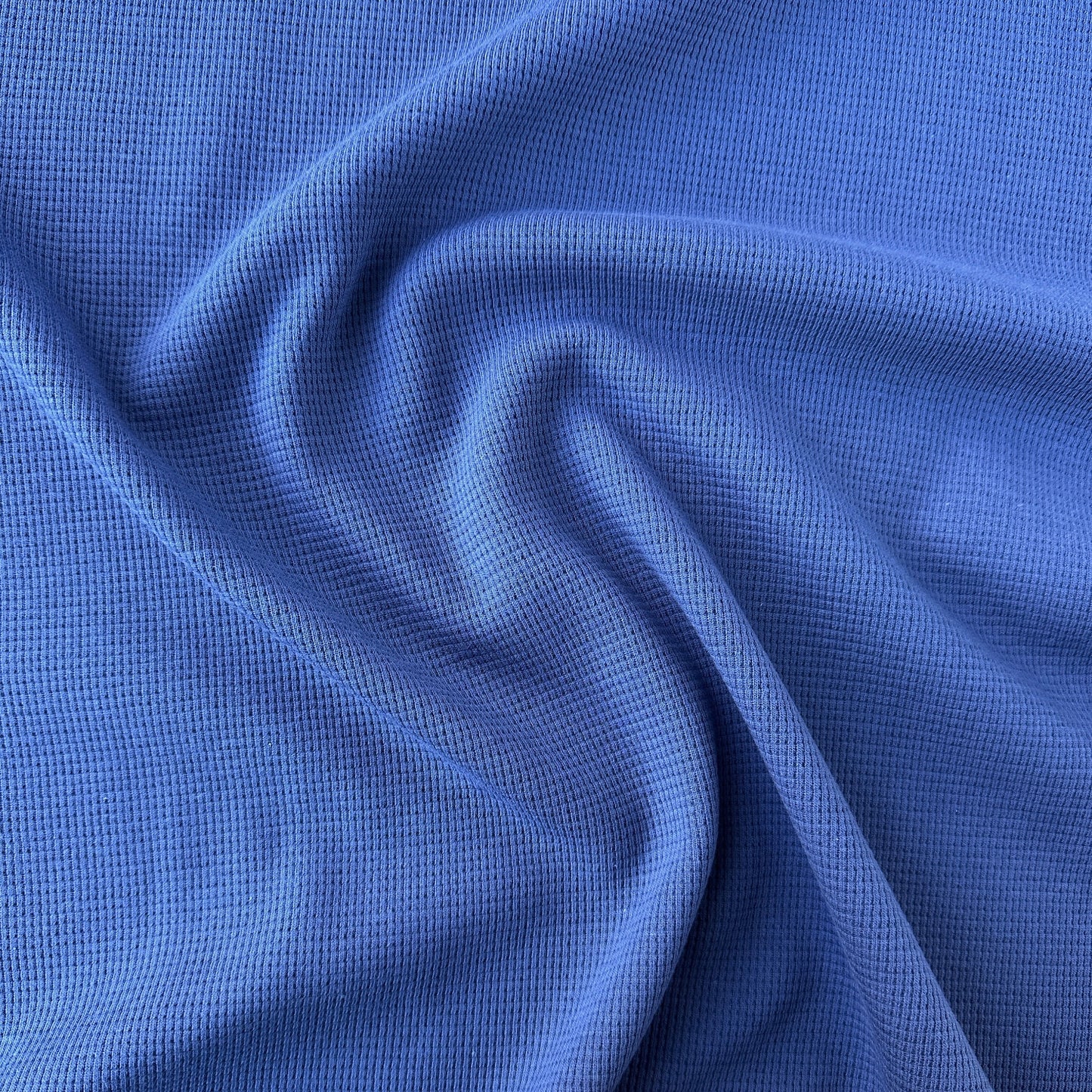 Blue waffle knit cotton fabric