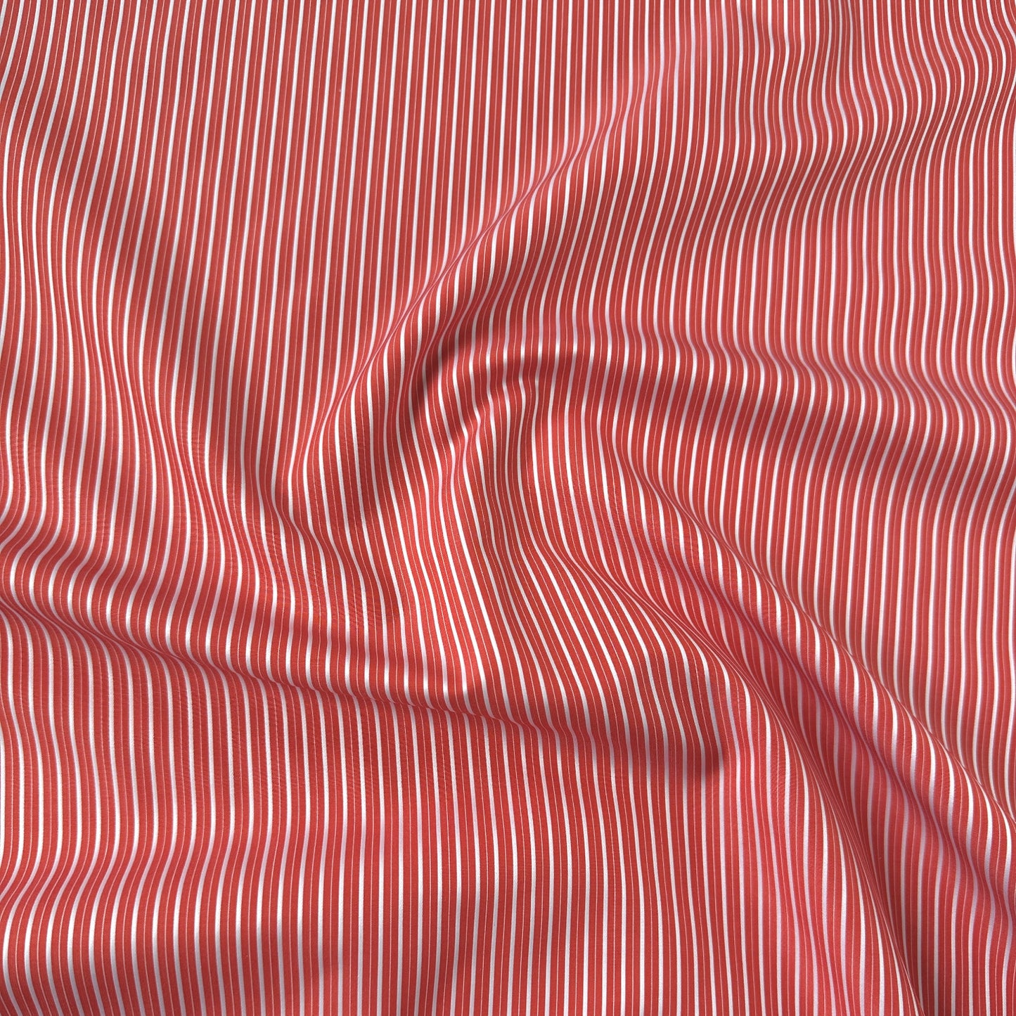 Coral stripe cotton dressmaking fabric