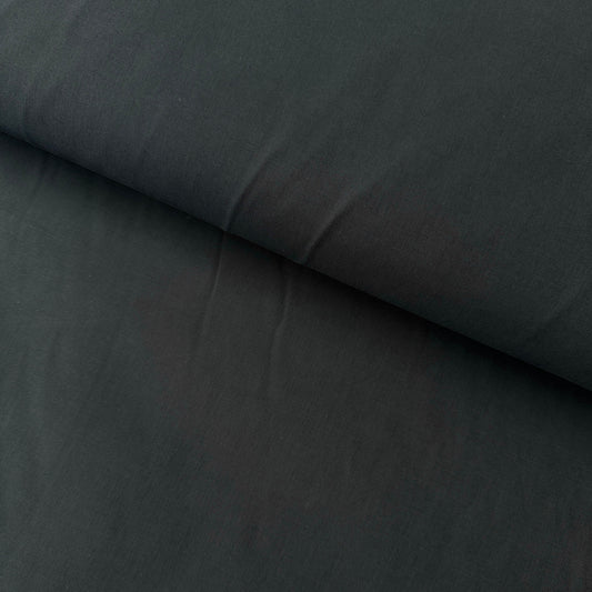 A close-up of a dark navy fabric