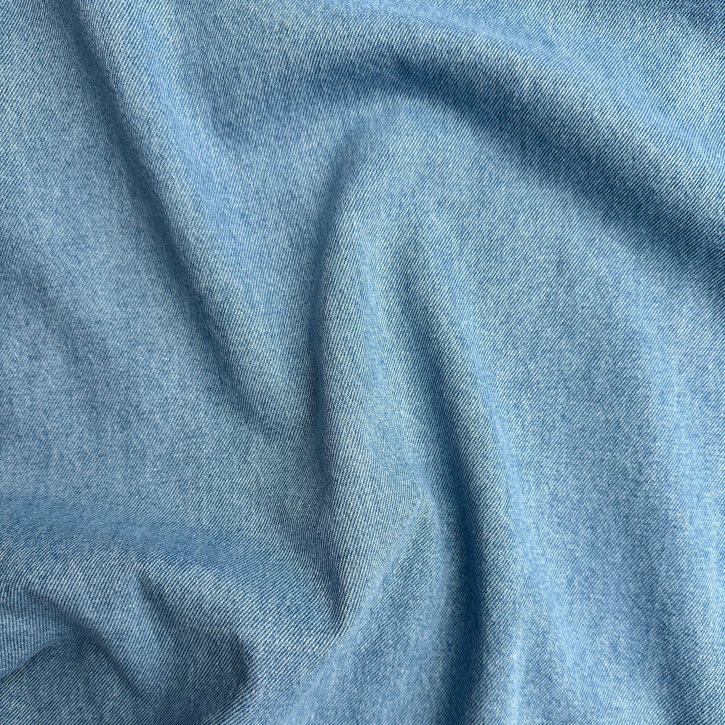 Distressed Cotton Denim Fabric showing texture