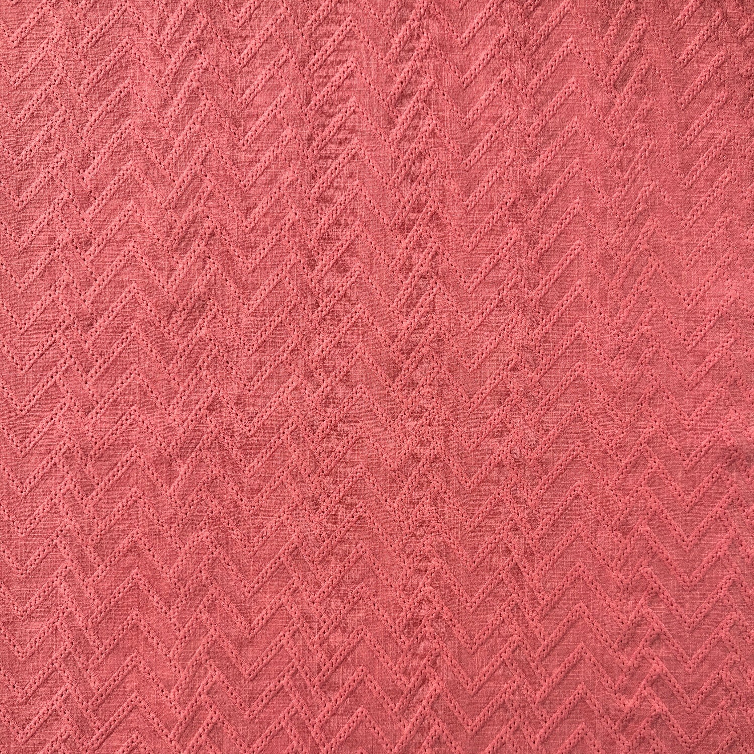Zig zag design on a pink cotton fabric