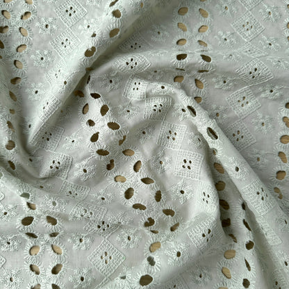Embroidery anglaise fabric in light green