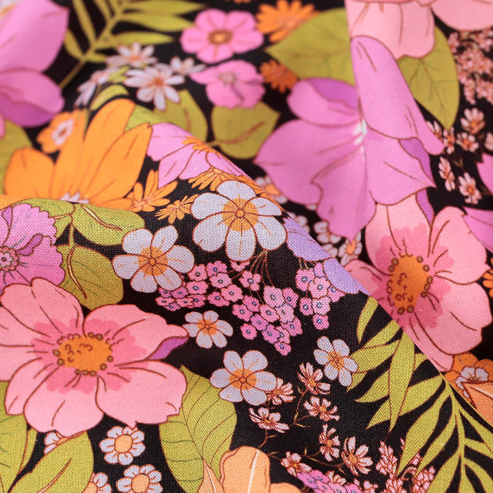 Close up of viscose linen fabric with flowers across it