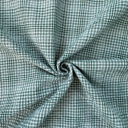 Swirl of green check seersucker fabric