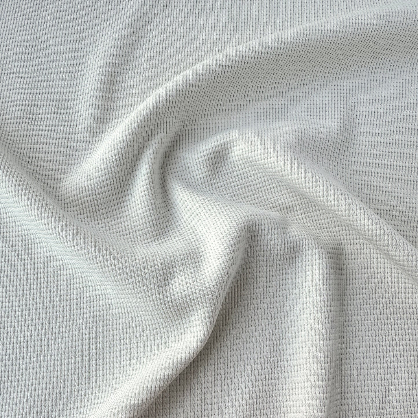 Ivory waffle knit cotton fabric