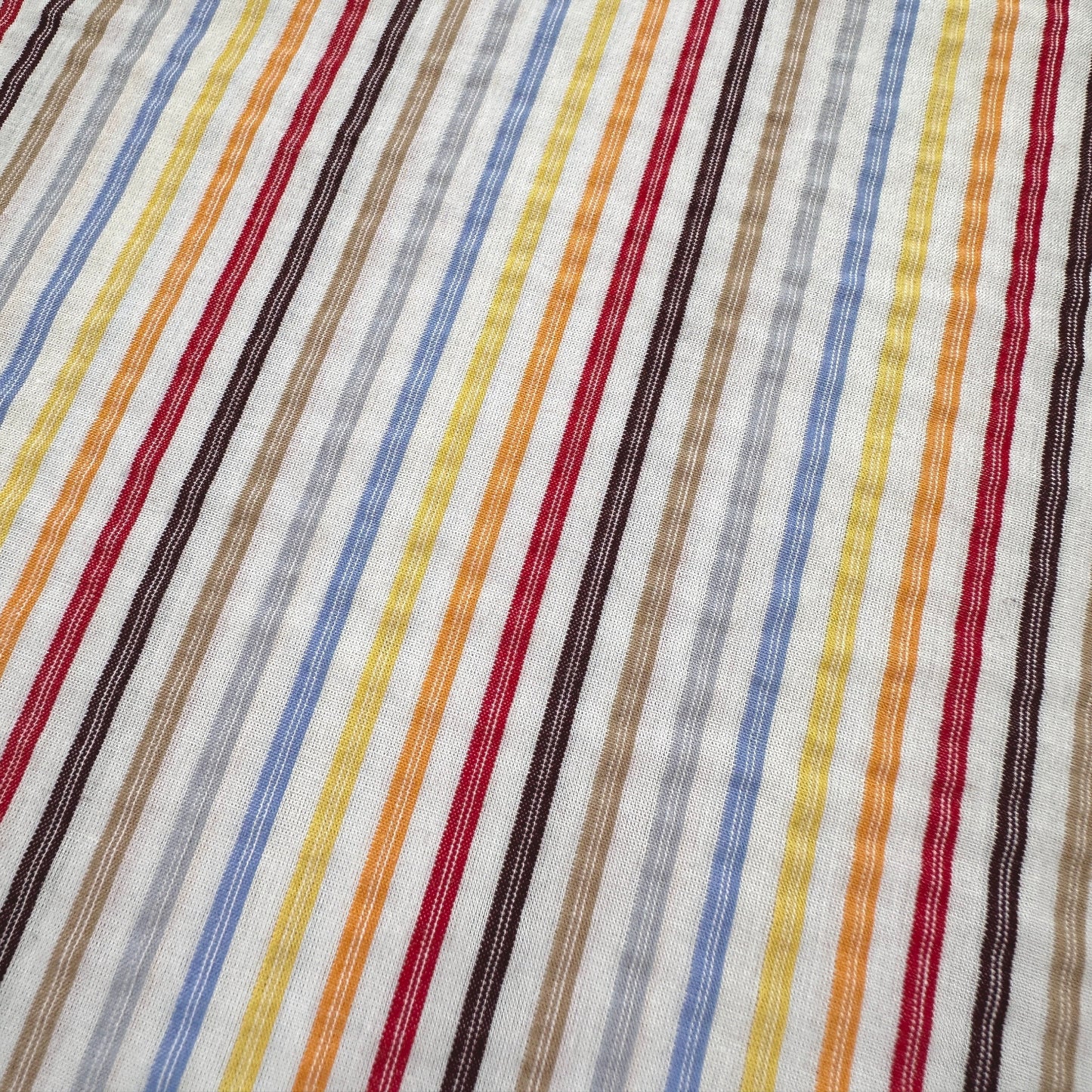 Close up of stripe dressmaking fabric