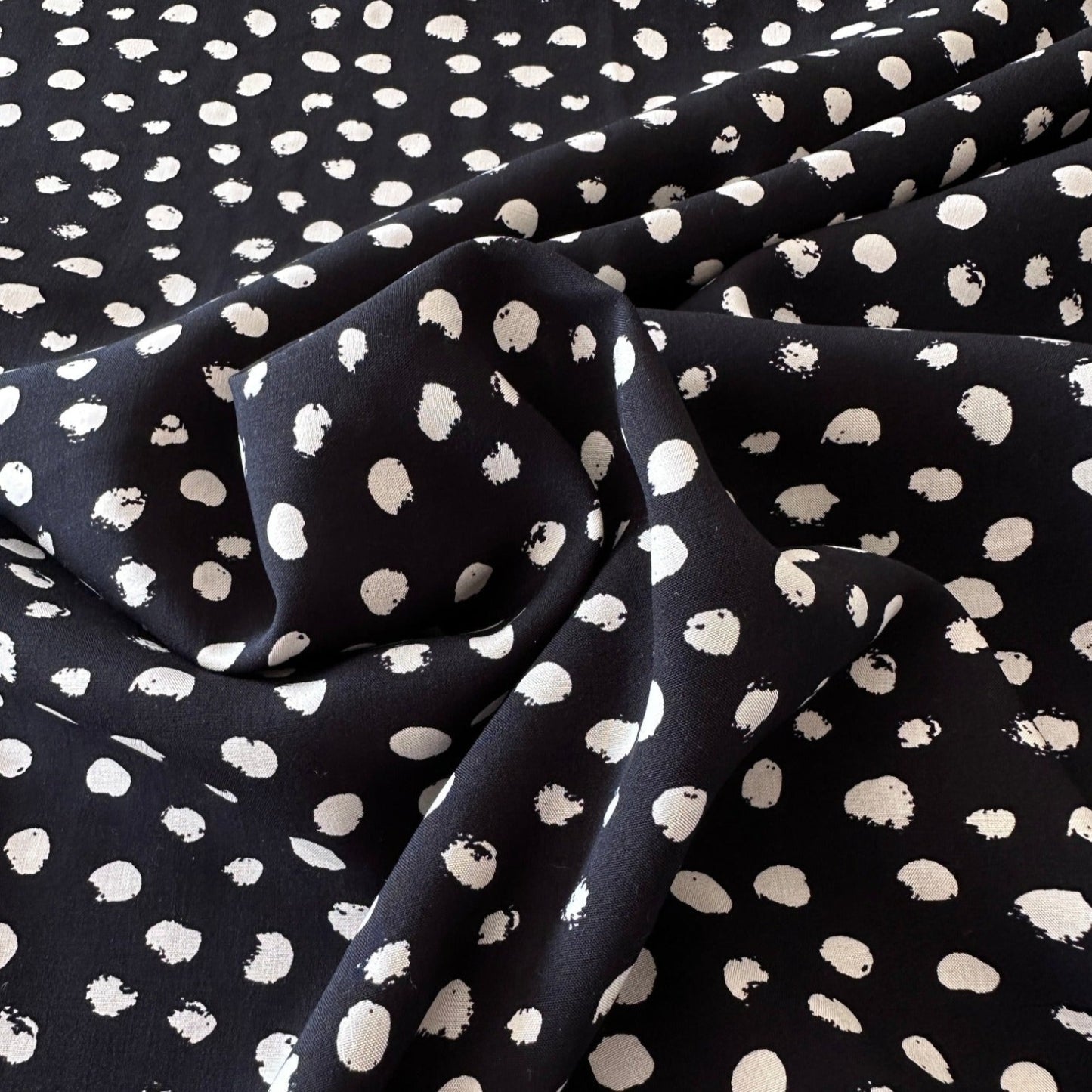 Painted Dots Viscose Fabric in Black