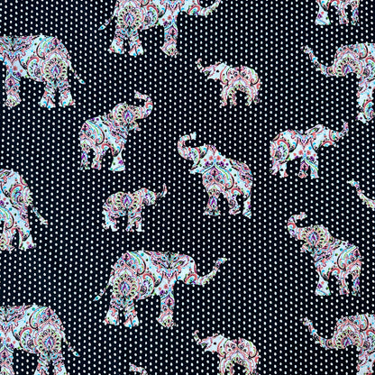 Fabric With Colourful Paisley Elephants on a Black and White Polka Dot Background