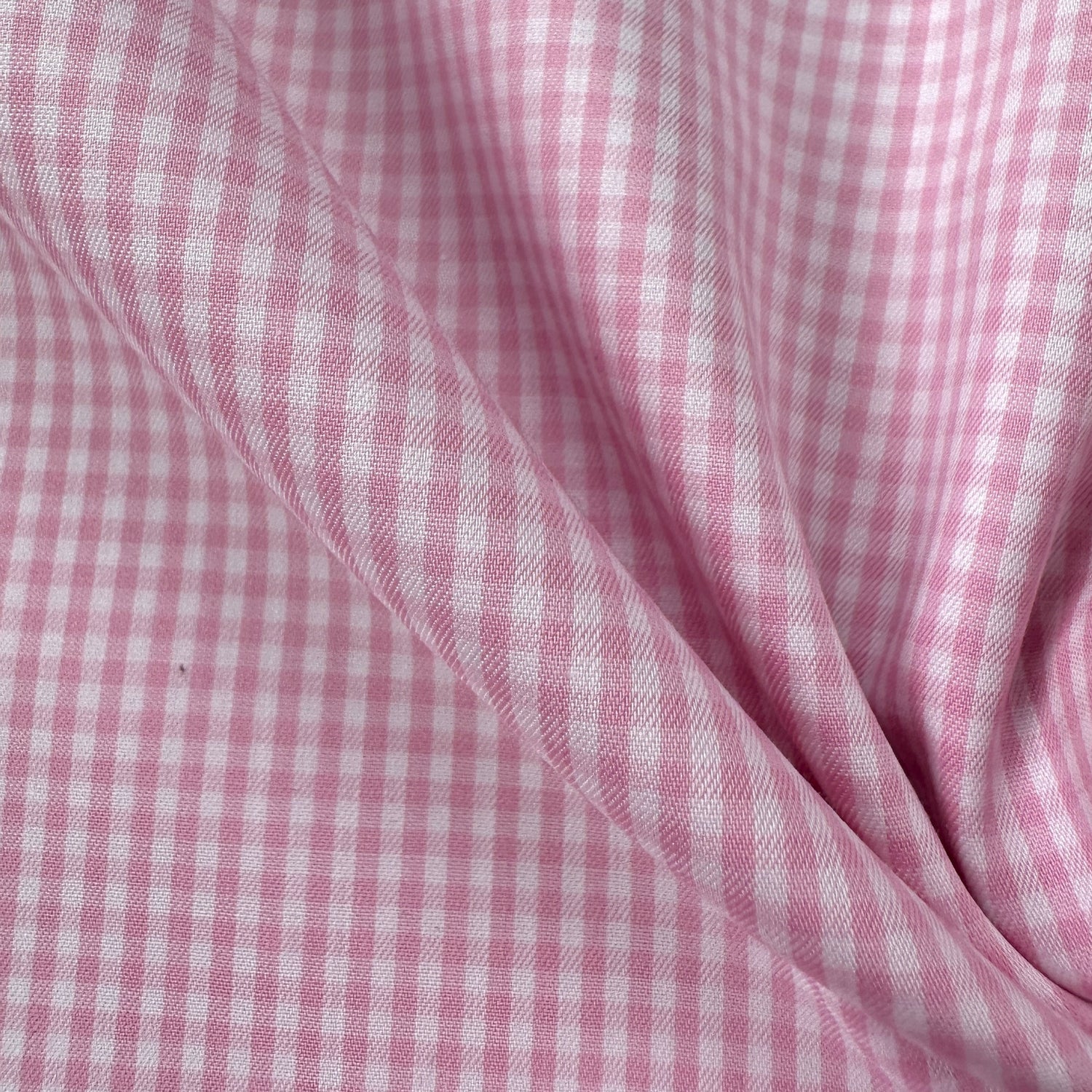 Close up of pink and white checked fabric