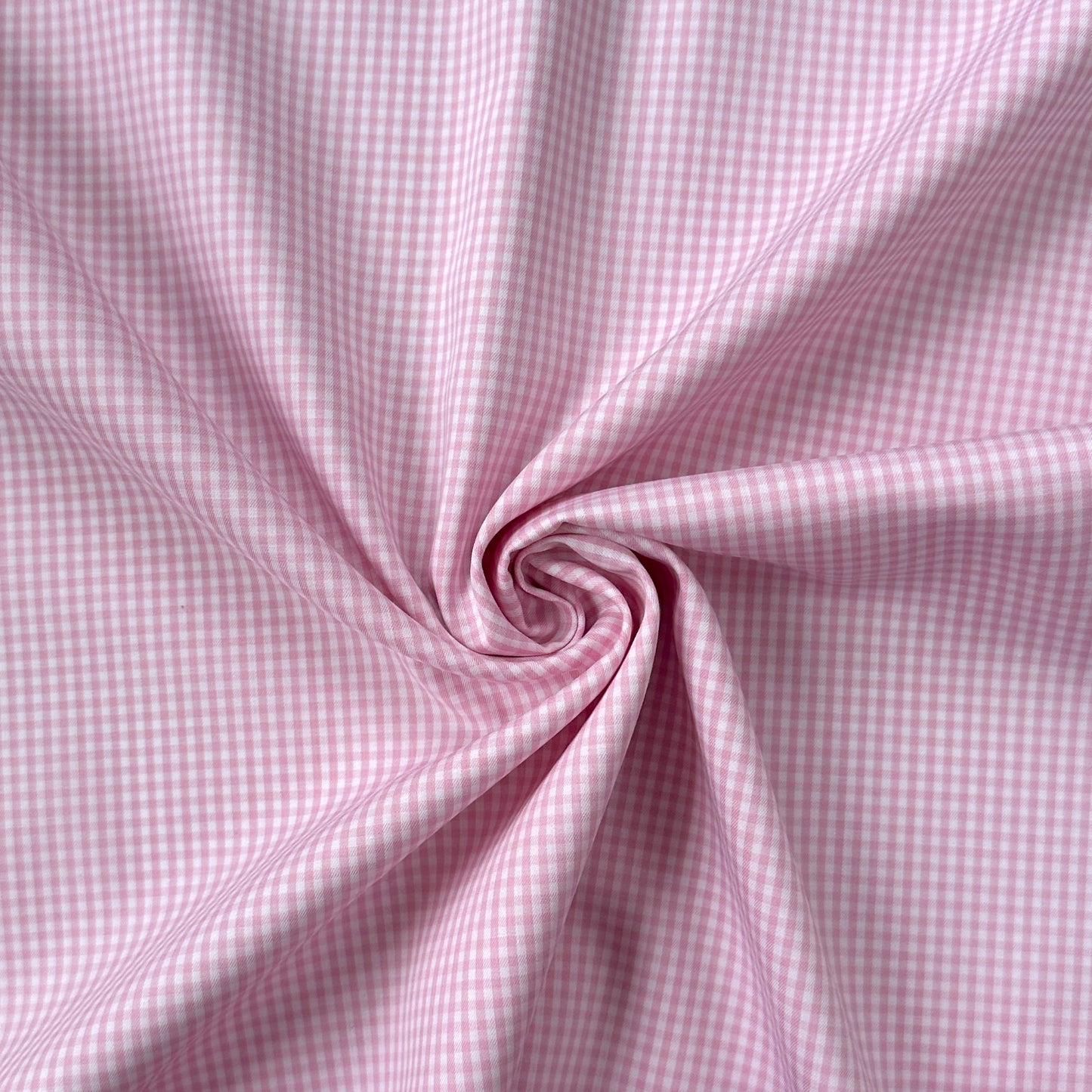 Swirl of pink and white check fabric