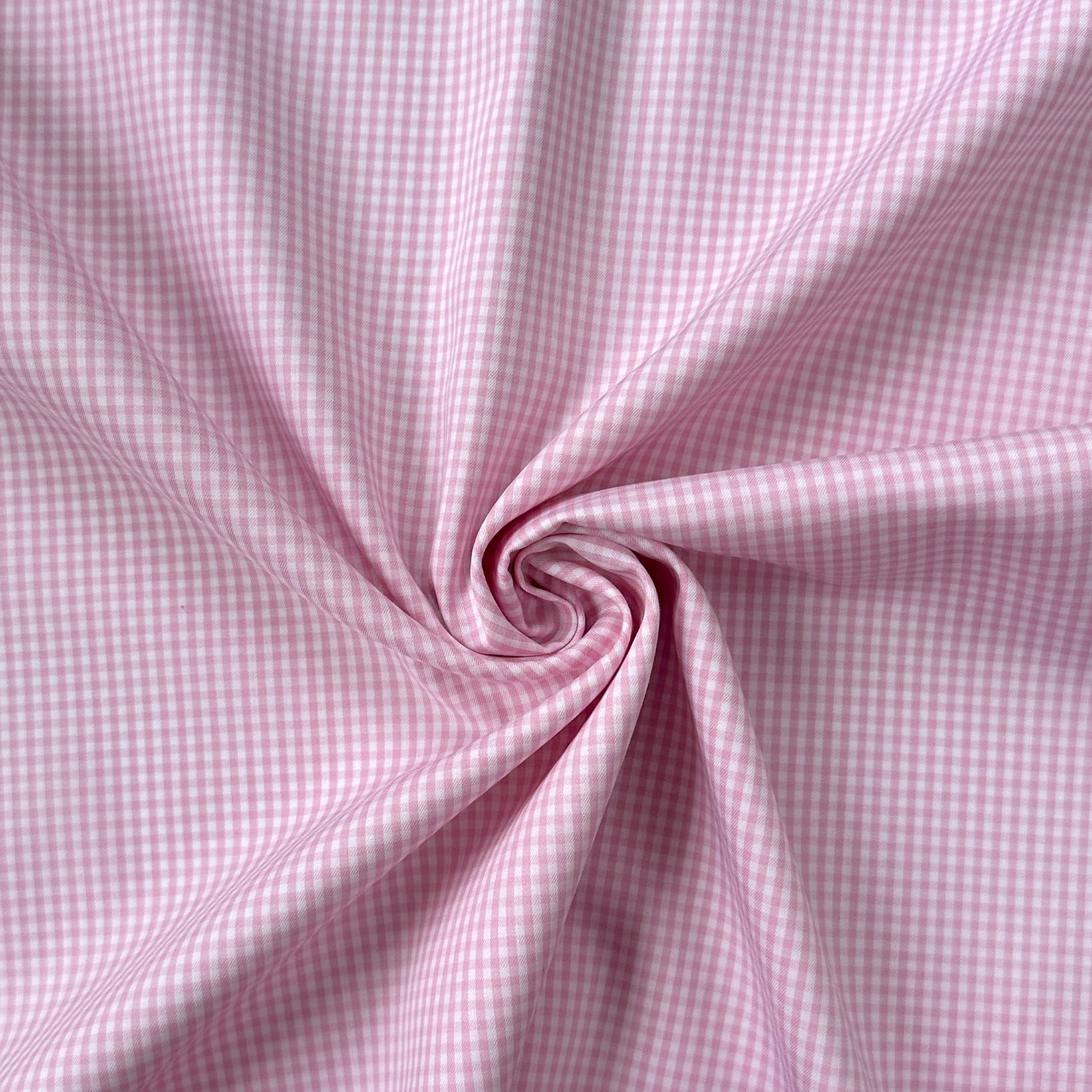 Swirl of pink and white check fabric