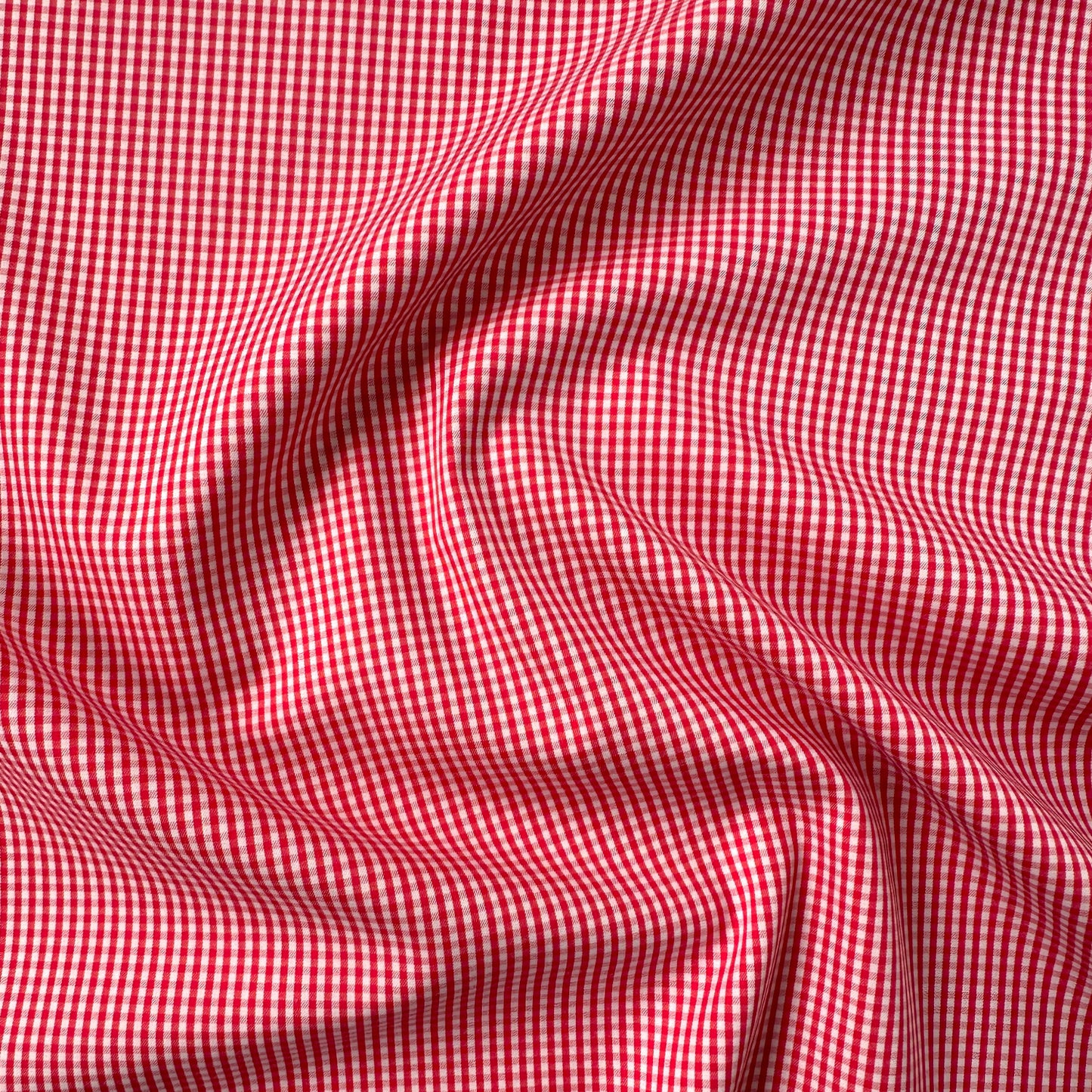 Red and white gingham dressmaking fabric