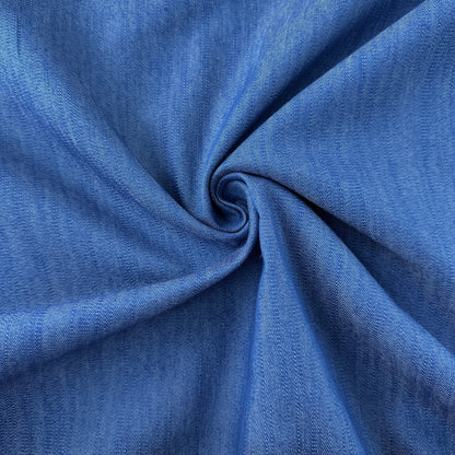 Close up of Textured Stretch Denim Chambray Fabric in Blue