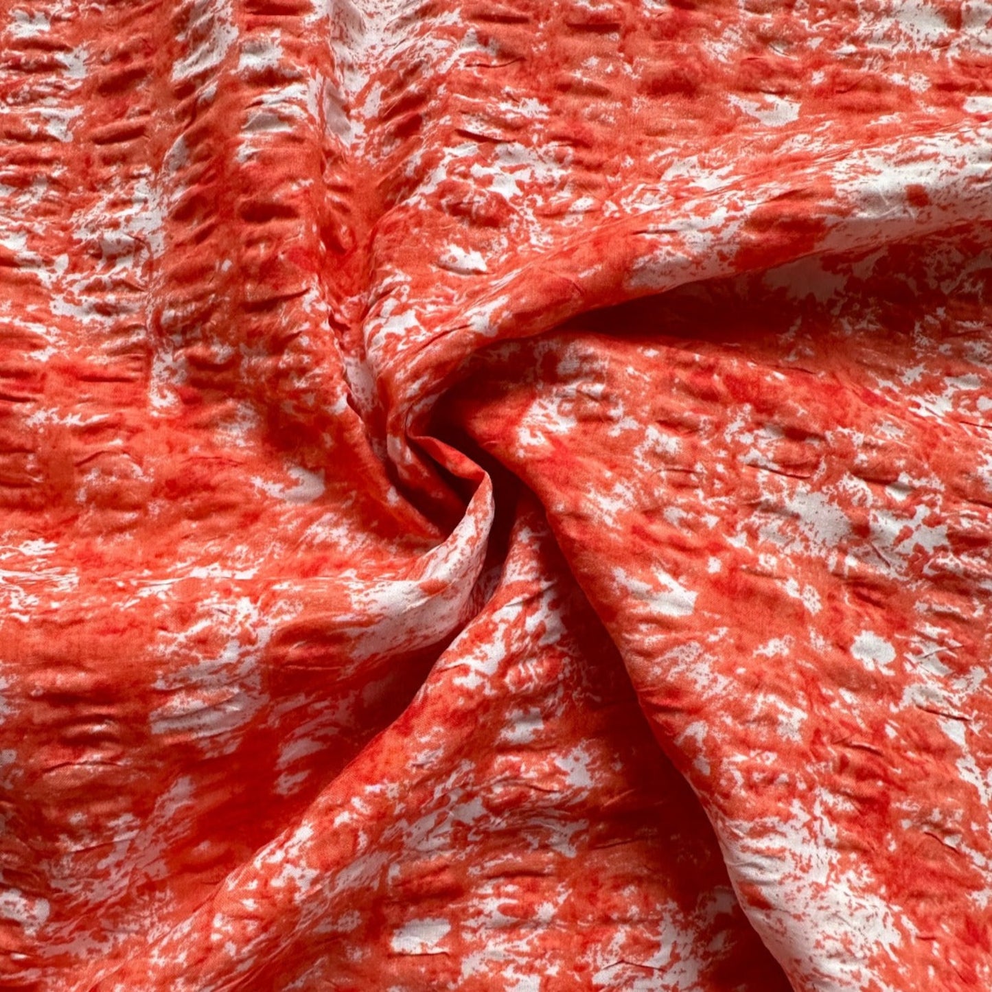 Tie Dye Cotton Seersucker Fabric in Orange
