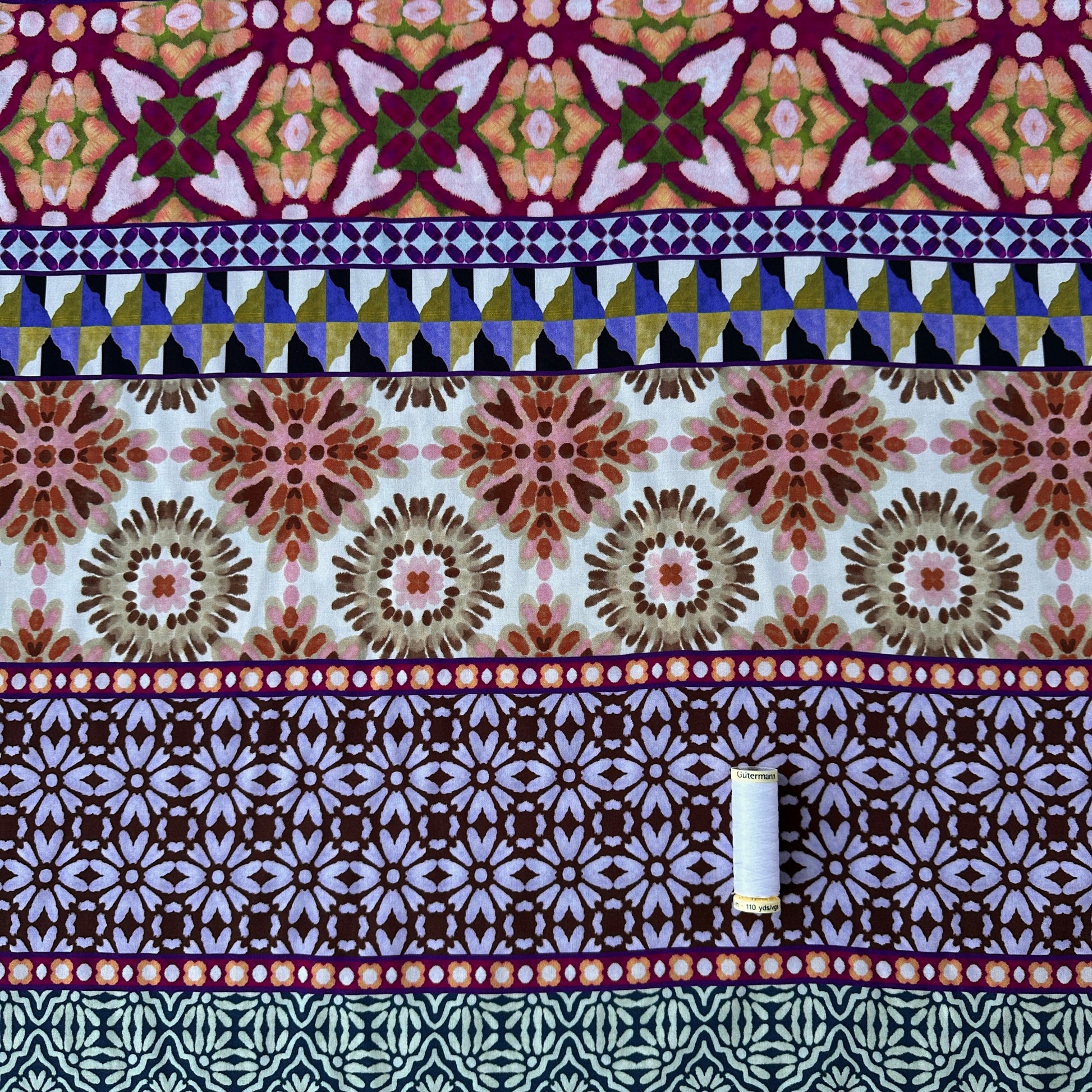 Tiles Tencel Lawn Fabric with reel of thread for scale