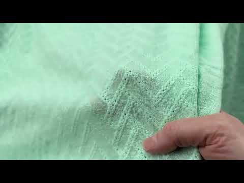 Video of embroidered zigzag cotton gauze fabric